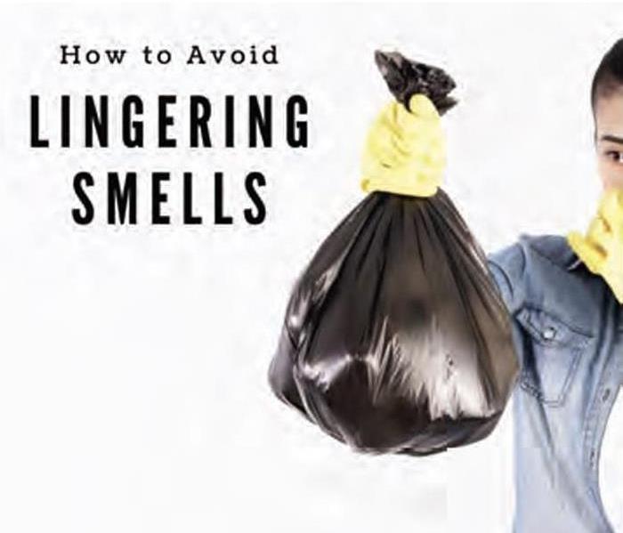 woman holding small trash bag. How to Avoid Lingering Smells